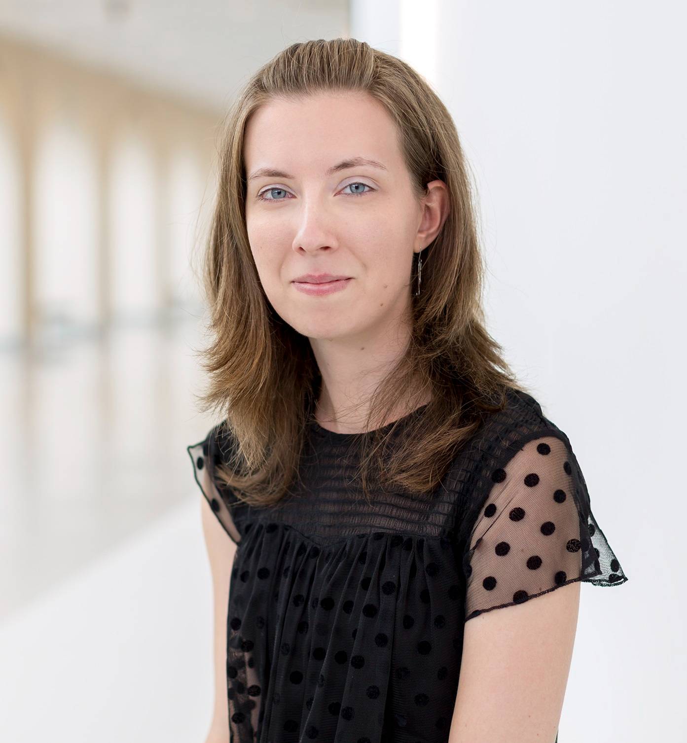 A photo portrait of Jana Zilova on a light background.
